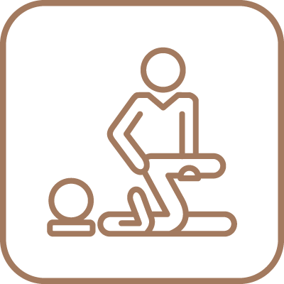 Icon of a doctor holding the knees of a patient